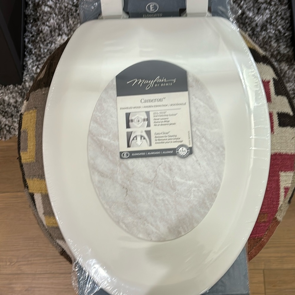 Mayfair by Bemis elongated enameled wood toilet seat
